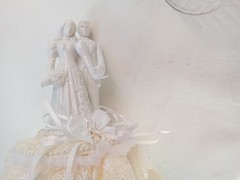 WEDDING TOPPER VTG COUPLE PORCELAIN WHITE FIGURES 8″ TALL SATIN & LACE RUFFLE