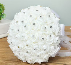 Wedding Bouquet Is a White Floral Arrangement