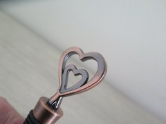 One Love, One Heart Copper Wine Bottle Stopper in Burlap Bag $25