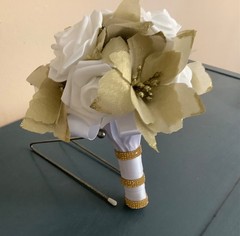 Gold poinsettia and rose wedding bouquet