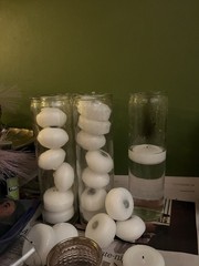 Bulk floating votive candles and holders