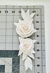 Handcrafted foam flowers for wedding invitation boxes and cards