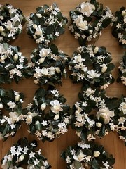 Stephanotis & White Rose Candle Rings, Dk Green Leaves-10″Dia . Set Of 14