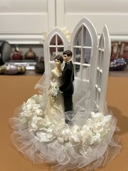 Wilton «Dedication» Wedding Cake Top, Black coat, black pants.